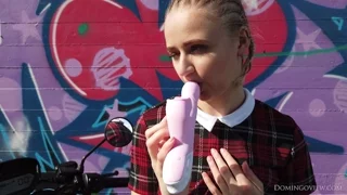 Leyla uses a pink vibrator at graffiti wall on the electro scooter frame 4