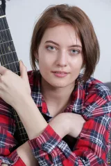 Nerd student with small titties Lola plays the guitar Preview picture 3
