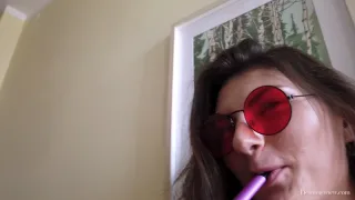Sascha Strips Nude with Vape and Red Shades frame 9