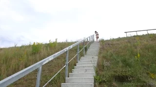 Sanija poses nude on stairs and speaks with me frame 10