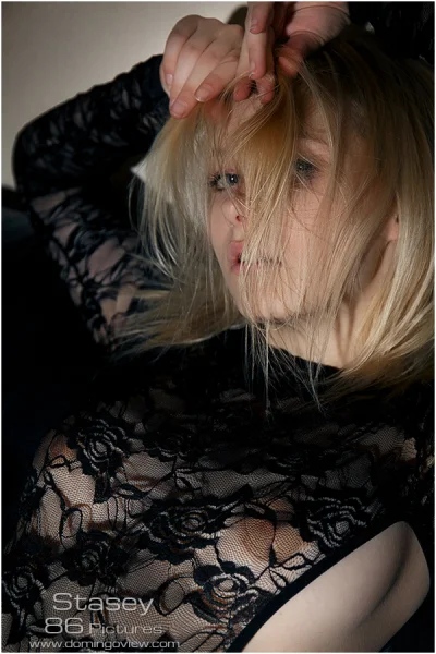 Stasey Metart model poses naked on the black coach Photo Cover