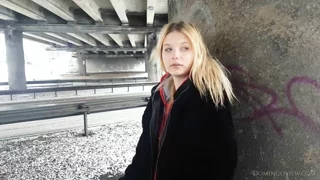 Stasey smokes on the street frame 1