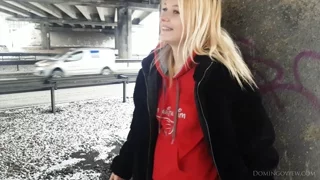 Stasey smokes on the street frame 2