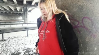 Stasey smokes on the street frame 3