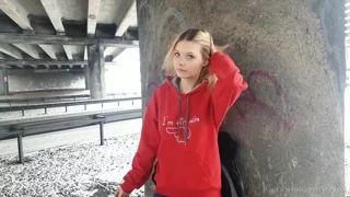 Stasey smokes on the street frame 6