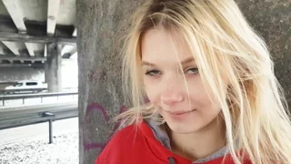 Stasey smokes on the street frame 9