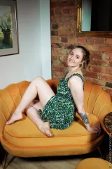 Aurora on Yellow Sofa Revealing Playful Poses Preview picture 1